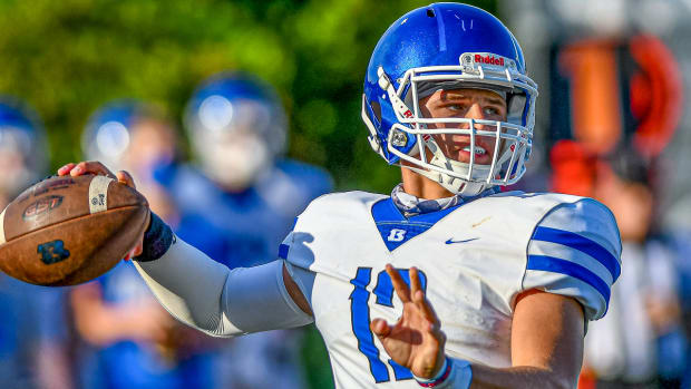Austin Ledbetter throwing a pass for Bryant in 2020.